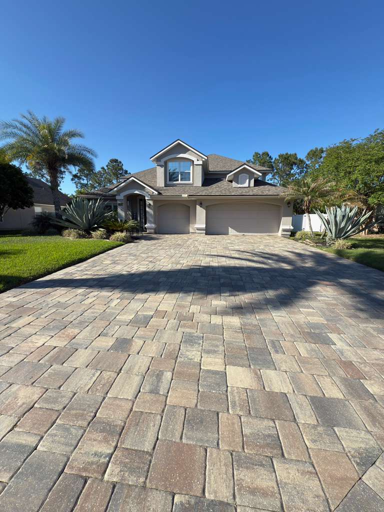Expansive paver driveway installed by Marblu at a Florida residence